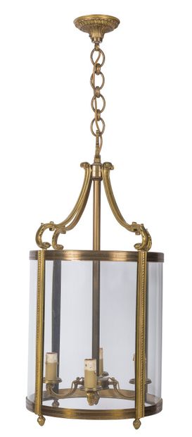 null A gilt bronze lantern of circular form, the light fixture with four arms of...