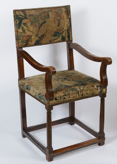 null Carved and moulded walnut armchair, armrests decorated with stylised foliage

Upholstery...