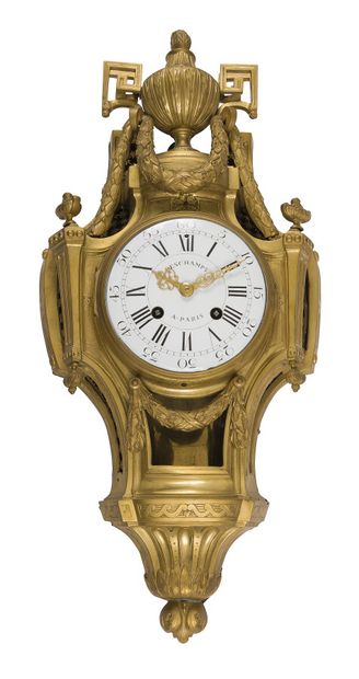 null GILT BRONZE CARTEL

decorated with vase, garlands and trellis the dial with...