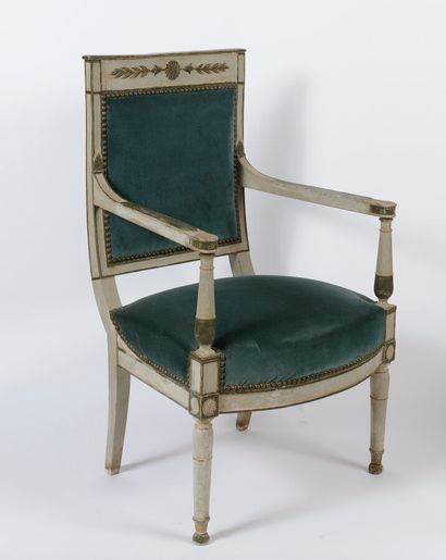null Moulded and carved wooden armchair, backrest decorated with foliage and flowers,...