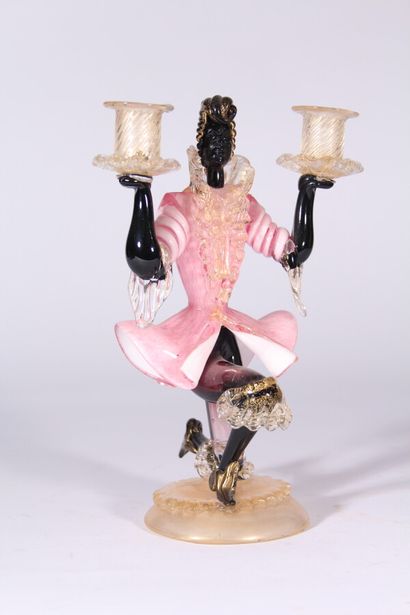 null Anthropomorphic candelabra in Murano glass tinted with gold powder 

20th century

H....