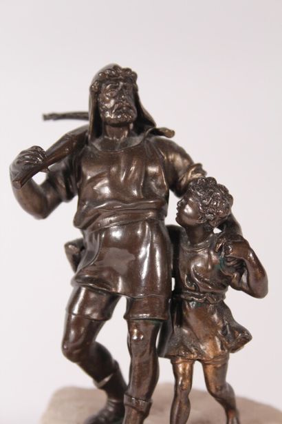 null GESETZL GESCH

"Archer accompanying a child".

Patinated bronze group on a hard...