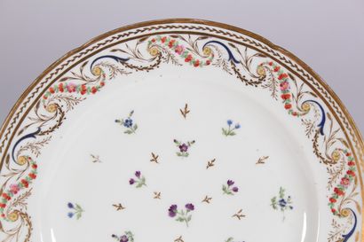 null Paris. MANUFACTURE OF NAST

Porcelain plate with polychrome decoration of flowers...