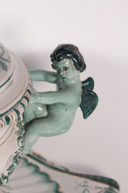 null Large earthenware tureen and its display stand decorated with cherubs in rocaille...