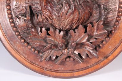 null Hunting trophy 

"Stag"

Wood carved in medallion with acorns and oak leaves,...