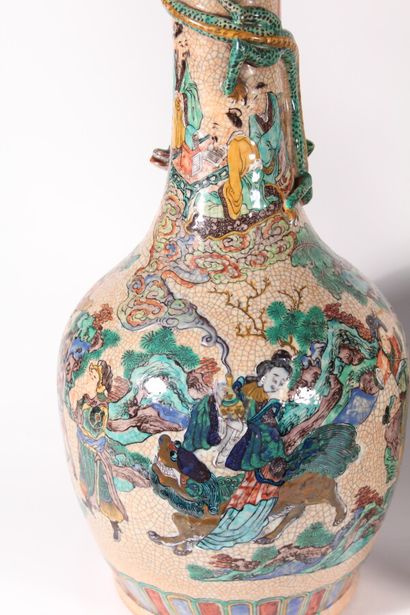 null Pair of cracked and glazed ceramic vases decorated with characters and a dragon...