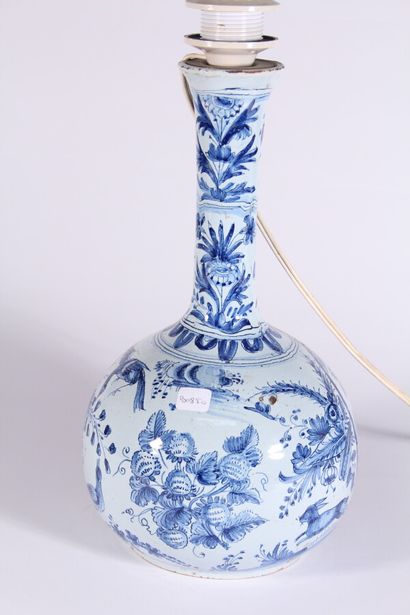 null Earthenware long neck vase with animated characters in a landscape 

Delft,...