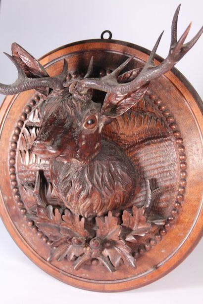 null Hunting trophy 

"Stag"

Wood carved in medallion with acorns and oak leaves,...