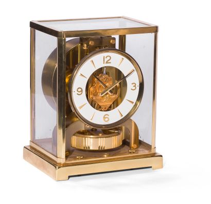 null Jaeger Lecoultre, Atmos clock, gilt brass and glass cage clock, white disc dial,...