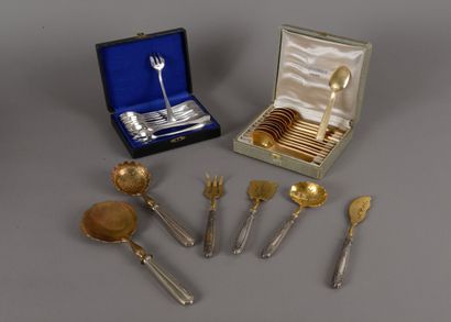 null Four cases: a four-piece hors d'oeuvres service, twelve Art Deco gilded metal...