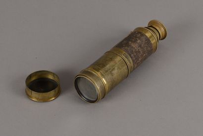 null 
Brass and leather telescopic bezel, mid 19th century.
