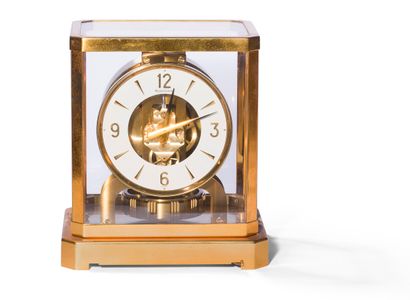 null Jaeger Lecoultre, Atmos clock, gilt brass and glass cage clock, white disc dial,...