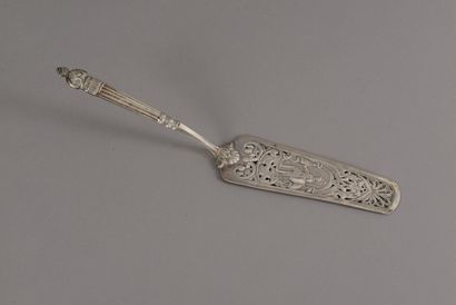 A silver cake shovel, the handle decorated...