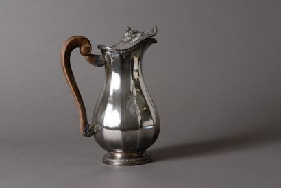 null Aiguière out of silver Minerve 950 thousandths of baluster form, posing on a...