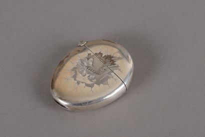 null Oval silver matchbox with a chased scene of sparrows pecking on one side and...
