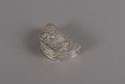 null Foreign silver pill box in half-cerlce, the lid with embossed decoration of...