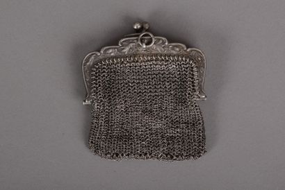 null Silver double compartment coin purse with embossed floral design, circa 1900...