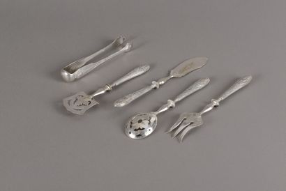 null A four-piece mignardises service, the handles in filled silver with Louis XVI...