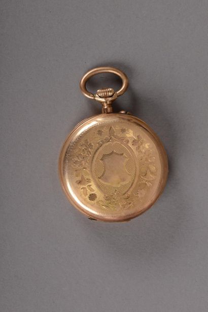 null Pocket watch in yellow gold 750 thousandth, back chased with decoration of a...