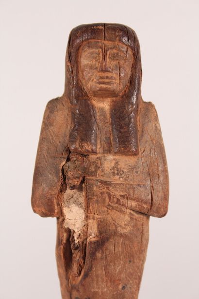 null Ouchebti en bois

Egypte, basse époque

H.: 24 cm