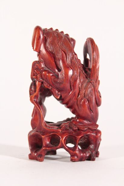 null Lion bouddhique en bois sculpté

Chine, XXème siècle

H.: 11 cm