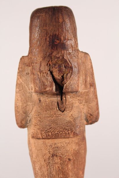 null Ouchebti en bois

Egypte, basse époque

H.: 24 cm