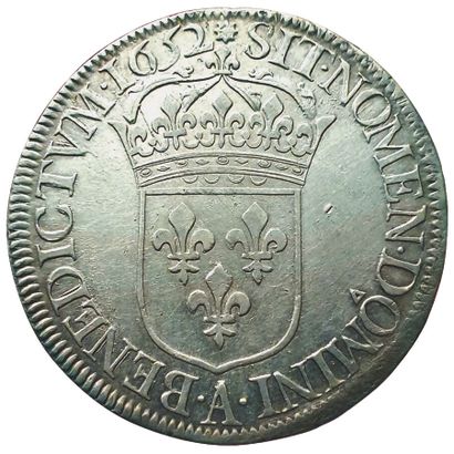 null LOUIS XIV. 

Ecu à la mèche longue. 1652 A. Paris.

27,2grs. Gad.202. TTB+/...