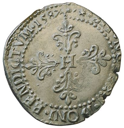 null HENRI III. 

Demi Franc au col plat.

1587 I. Limoges.7,05grs. Sb.4716. TTB...