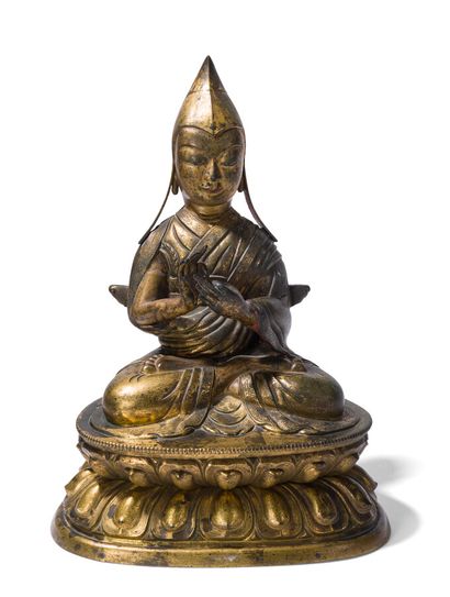null Statuette de Tsongkhapa en cuivre repoussé et doré

Tibet, fin du XVIIIème siècle

H.:...