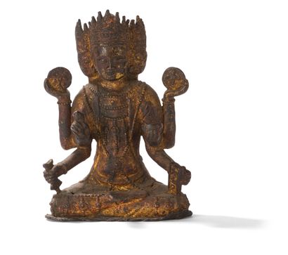 null Statuette d'Avalokitesvara en fonte de fer laquée or et rouge

Chine, XXème...