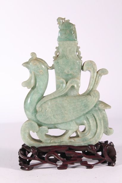 null Vase en quartz sculpté 

Chine, XXème siècle

A décor d'un phénix supportant...