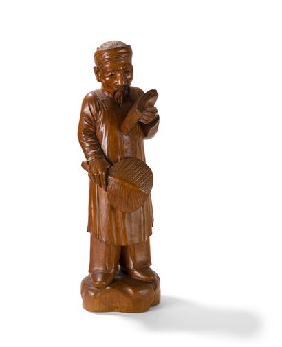 null Statue de vieillard en bois sculpté

Vietnam, XXème siècle

Représenté debout...