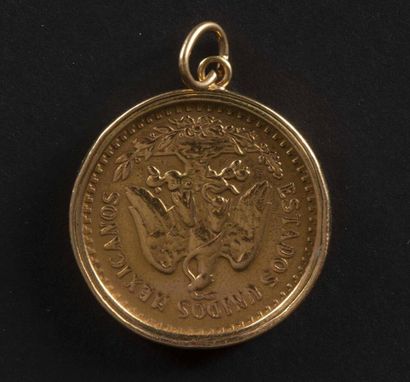null Pendant false coin of 50 pesos in yellow gold 750 thousandths, the sawed bélière...