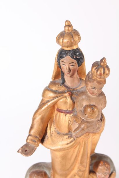 null Vierge d'Aubagne en terre cuite polychrome

XIXème siècle

H.: 31 cm

(Accidents...