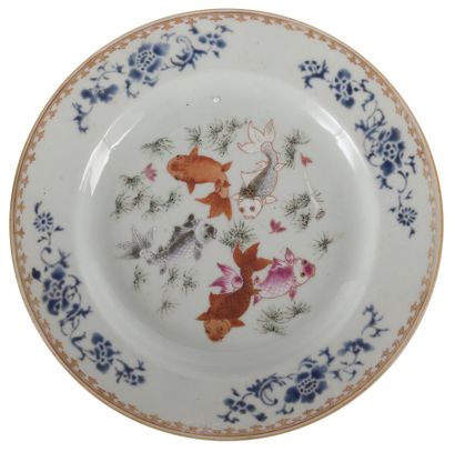 null Polychrome porcelain plate

China, 18th century

Decorated with carps and aquatic...