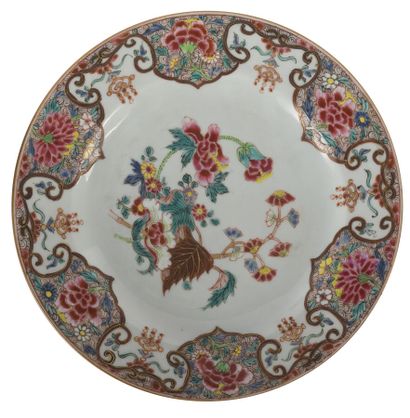 null Famille rose porcelain plate

China, 18th century

With central decoration of...
