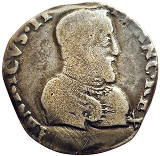 null Henry II. Teston with naked head 1st type . 1561 T. Nantes. 9,20grs. Gad.373...