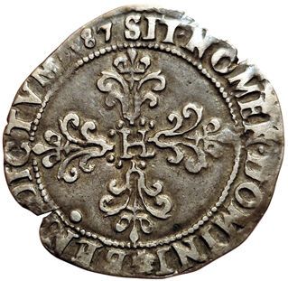 null Henri III. Demi-Franc au col plat. 1587 T. Nantes. 6,56grs. Gad.487 ( R ). ...