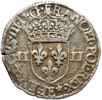 null Henri III. Quart d'écu. 1586 E. Tours. 9,70grs. Gad.495 (R3). 31727 ex. Rare....