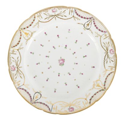 null BORDEAUX
PLATE WITH CONTOURED EDGE IN PORCELAIN
with polychrome decoration of...