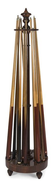 null CIRCULAR BILLIARD CUE HOLDER IN MAHOGANY*.
H.: 167 cm.
Fourteen cues and three...