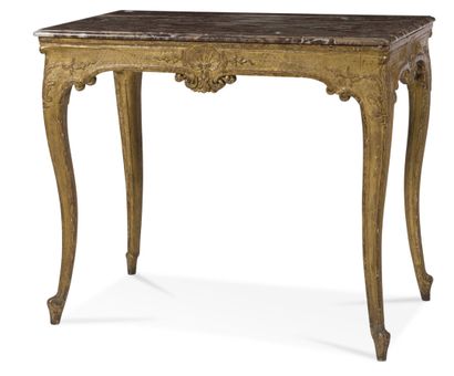 null TABLE IN CARVED AND GILDED WOOD
of rectangular shape, the belt decorated with...