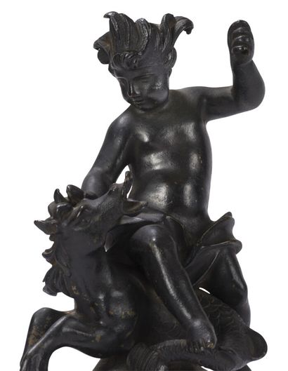 null GROUP IN LACQUERED BRONZE
representing a fight between a child and a sea horse;...