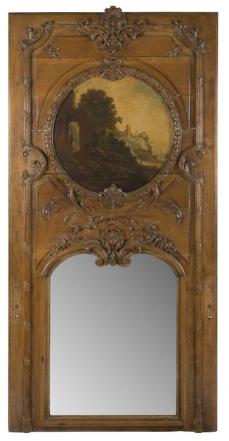 null TRUMEAU IN CARVED OAK 
framed with ribboned rush, shells, foliage and staples,...