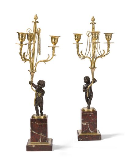 null PAIR OF CANDELABRAS THEY CHILDREN IN PATINATED BRONZE AND GILDED BRONZE
with...