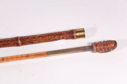 null Cane with "toise" system in bamboo, ferule and brass ring, length 92 cm.