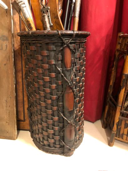 Umbrella stand in woven bamboo. Missing the...