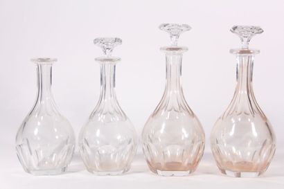 null Baccarat, series of four crystal decanters with ribs, two different heights,...