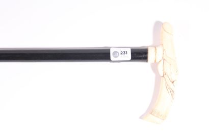 null Erotic cane, black wood shaft, crutch knob in ivory carved with a naked female...