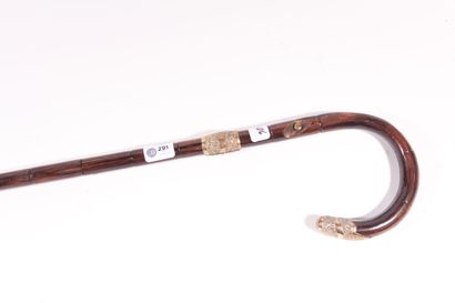 null Cane with folding rattan stock, ring and tip of the knob in chased metal. 91.5...